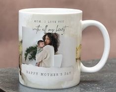 a mother's day coffee mug with an image of a woman holding her child