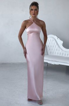 The sleek, sexy lines of Sinead in Peach is everything we want and more this season. In an gorgeous peach tone, this maxi is cut from our luxe non-stretch satin which skims the figure, designed with a super chic neckline that's high and narrow. The low V-shaped back is the main character, with self tie detail for that perfect fit.Ã‚Â 



Colour: Peach.

Premium non-stretch satin.

Fully lined.

Beautifully skims over figure.

High, narrow neckline.

Shaped under bust with piping.

Low V-shaped b Butterfly Cages, Peach Dress Outfit, Coral Prom Dress, Brothers Wedding, Slim Bodycon Dress, Backless Dress Summer, Prom Inspo, Dress Peach, Backless Bodycon Dresses