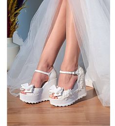 Hello ladies, That day is your most beautiful and special day. It is your natural right to be comfortable and dance comfortably. *These stylish and comfortable shoes are for you. Heel height :11 cm platform: 3 cm Mold size is half size comfortable. I wish you to use it in good days.. Best Regards... Bride Sneakers Wedding, Sneakers Bride, Platform Bridal Shoes, Wedding Sneakers For Bride, Bridal Shoes Wedges, Sneakers Wedding, Bride Sneakers, White Platform Heels, Bedazzled Shoes