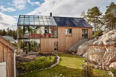 a house that is next to some rocks