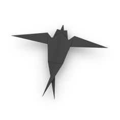 a black origami bird on a white background