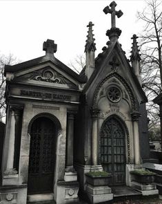 an old cemetery with a cross on top