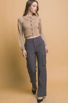 Elevate your style with our Short Collared Sweater. This chic sweater features a sophisticated short collar and is made from a high-quality fabric blend. The earthy Khaki color adds a modern and versatile touch to this elegant design. Key Features: Fabric: Crafted from 90% acrylic, 7% polyester, and 3% metallic, offering a soft, durable, and subtly shimmering finish. Fit: Designed for a flattering fit with a short collar that enhances its refined look. Color Options: Available in a trendy Khaki. Chic Sweater, Collared Sweater, Rock Outfit, Chic Sweaters, Activewear Sets, Collar Sweater, Khaki Color, Metallic Thread, Sweater And Shorts