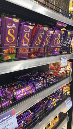 chocolates are on display in a grocery store