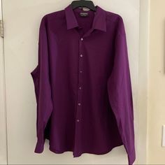 Van Heusen {Flex} Brand. Nwot. Features A Nice Purple/Eggplant Color. Long Sleeves. Button Down. Has A Collar. Very Stretchy! Great Shirt To Dress Up! Pit To Pit Measures Approx 27” Across 34/35 Sleeve Length Neck: 18-18.5 Purple Long Sleeve Dress Shirt With Buttons, Purple Long Sleeve Dress Shirt With Button Closure, Purple Cotton Long Sleeve Dress Shirt, Purple Long Sleeve Cotton Dress Shirt, Fitted Collared Purple Dress Shirt, Fitted Purple Dress Shirt With Button Closure, Casual Purple Business Tops, Casual Purple Tops For Business, Business Shirt With Buttons In Purple