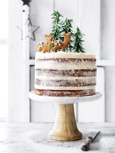 a cake with frosting and decorations on top