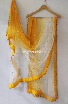 This is a Dupatta made on orders. It is made using net fabric with gold sequinces embroidery all over. We make it colored as shown in the picture. Then we stitch a beautiful golden lace to all sides of it. Dupatta is having a length of 100 inches and width of around 40 inches. I don't keep it readymade I only make it exclusively for my customers. Can be fully customised. Duppattas Designs Ideas, Plain White Dress, Mint Outfit, Party Wear For Women, White Lehenga, Floral Frocks, Suit Salwar, Girls Party Wear, Lehenga Suit