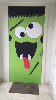 a door decorated with an image of a monster