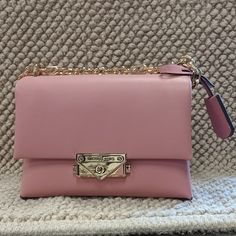 Style: Michael Kors Cece Small Convertible Flap Crossbody Shoulder Bag Material: Vegan Faux Leather Color: Primrose (Pink) With Gold Hardware & Tan Lining Features: Adjustable Chain/Leather Strap (Crossbody Or Shoulder Wear), Outer Slip Pocket, Push Lock Flap Closure, 2 Main Inner Compartments, 3 Inner Card Slots Measures: 7.25" W X 5" H X 3.75" D Michael Kors Pink Crossbody Bag, Michael Kors Feminine Bags With Gold-tone Hardware, Blush Crossbody Bag With Gold-tone Hardware, Pink Crossbody Satchel With Gold-tone Hardware, Michael Kors Pink Shoulder Bag With Gold-tone Hardware, Leather Chain, Michael Kors Bag, Gold Hardware, Crossbody Shoulder Bag