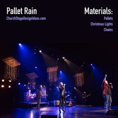 the band called pallet rain is performing on stage with their microphones up in the air