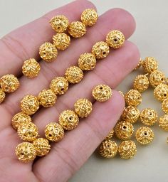 Listing of  9mm -5pcs Bali Gold Beads - Round Gold Spacer Beads - Copper gold plated -Beads. A Beautiful Round  Bali Beads Approximate Measurements: Size - 8mm Material: Real Gold plated over solid Copper Polish :24k Gold Plated Sold As - 5 Pieces Shape - Round  Bali Beads All Items are made in own production by Hand by Skilled craftsmen. We do Wholesale/Bulk orders .Please Do Message Us  100% Satisfaction Guarantee on all my products or you can return it for a full refund  Generally We Ship Wit How To Polish Copper, Fancy Beads, Unique Charms, Gold Beads, Real Gold, Spacer Beads, Bali, Gold Plate, Accessory Gift