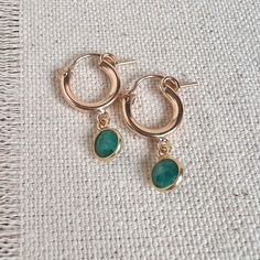 Green 14k Gold Hoop Earrings, Green Huggie Earrings For May Birthstone, Green Nickel-free Huggie Earrings, Green Hoop Huggie Earring, Dainty Green Hoop Earrings, Dainty Green Round Hoop Earrings, Handmade 14k Gold Huggie Earrings, Green Small Hoop Huggie Earrings For May Birthstone, Everyday Green Lever Back Earrings