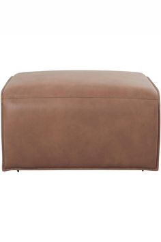 a large brown leather ottoman with metal legs