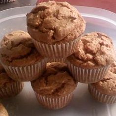 a white plate topped with muffins on top of a table