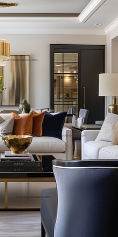 a living room filled with furniture and a chandelier