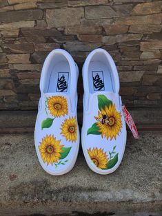 SUNFLOWER and BEE paint slip on shoes All Items is 100% hand painted with acrylic. They are water-proof, permanent and no fading. You can also change the color, enter the name or customize whatever design you like on shoes. Just send us a message. Suggest clean the shoes by hand with soft brush. S H O E S We offer four types of shoe for your choice 1) Slip on Vans style 2) Soft Slip on shoe 3) Basic lace up sneaker 4) Vans Slip on/ Authentic Kids shoe is available (generic brand) EU 24 = insole Disney Painted Shoes, Sunflower And Bee, Sunflower Vans, Painted Shoes Diy, White Slip On Sneakers, Painted Canvas Shoes, Painted Vans, Jeans And Vans, Painted Sneakers