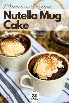 two mugs filled with chocolate cake and ice cream on top of a striped towel