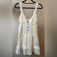 Princess Polly Romeo Mini Dress In White. Us Size 6. Off White Cotton Mini Dress With Ruffles, Wrap Sweater Dress, White Wrap Dress, Princess Polly Dresses, Polly Dress, Mini Cami Dress, Purple Mini Dresses, Green Mini Dress, Mini Dresses Summer