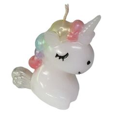 an inflatable white unicorn with multicolored hair