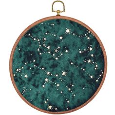 a round ornament with stars on it