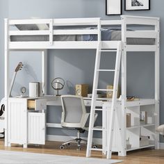 a white loft bed with desk and ladder