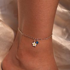 Delight her with our Daisy Birthstone Anklet! Featuring cute daisy charms and vibrant birthstones, this ankle bracelet is the perfect personalized gift for her. Add a touch of whimsy and elegance to her style with this charming piece. #YOU MAY LIKE THIS Gold paper clip anklet https://www.etsy.com/listing/1530606697/gold-paper-clip-anklet-personalized Delicate Circle Anklet https://www.etsy.com/listing/1501878352/delicate-circle-anklet-unique-ring-coin # SPECIFICATION -Material: Brass -Color: 16k gold plating Chain length: 10.5" Please contact us if you need to change chain length. # CARE INSTRUCTION Keep away from the water and soap to maintain good condition! JAN - Garnet FEB - Amethyst MAR - Aqua blue APR - Crystal MAY - Emerald JUNE - LT Amethyst JULY - Ruby AUG - Peridot SEP - Sapphire Dainty White Anklets Perfect For Gifts, Dainty White Anklets As Gift, Dainty White Anklet Suitable For Gift, Dainty White Anklets For Gift, Adjustable Dainty Anklets With Colorful Beads, Elegant Blue Anklets For Gifts, Spring Flower Anklets, Aquamarine Anklet, Blue Ocean-inspired Anklets For Summer