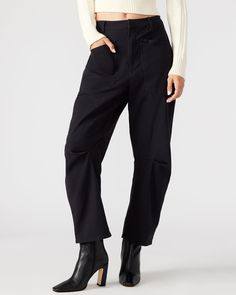 Introducing the HANIEL pant - a professional and stylish barrel leg pant with utility pockets made from stretch cotton twill. Enjoy the comfort and versatility of these pants while looking polished and organized. Perfect for work or casual wear. Barrel leg pant Two functional front pockets Inseam: 27" 98% cotton 2% elastane Hand wash Amelia is 5ft 10.5in and is wearing a size small Fit tip: If you are in between sizes, size down Imported Relaxed Fit Cargo Pants For Work With Belt Loops, Versatile Cargo Pants With Side Pockets For Work, Versatile Wide-leg Cargo Pants For Workwear, Versatile Cargo Pants For Workwear, Loosely Fitted Utility Work Pants With Tapered Leg, Versatile Straight Cargo Pants With Patch Pockets, Utility Work Pants With Loosely Fitted Hips, Chic Straight Leg Parachute Pants For Work, Versatile Workwear Cargo Pants With Pockets