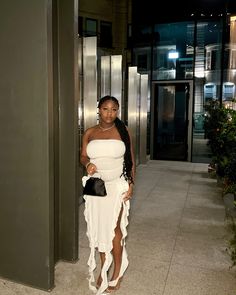 White ruffle dress outfit. White birthday dress idea. White ruffle split hem dress aesthetic. White dress on black women. White dress on black girl braids White Bodycon Dress Black Women, Ruffle Dress Black Women, All White Club Outfits Black Women, White Birthday Outfits Black Women, White Dresses Black Women, White Dress Outfit Black Women, Black Woman White Dress, White Birthday Dress Black Women, All White Dinner Outfit