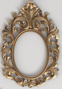 an ornate gold frame on a white wall