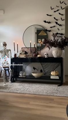 a living room decorated for halloween with skeleton decorations