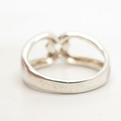 Has an engraving, but can be removed by a local jeweler. 925 Sterling Silver Vintage Abstract Heart Design Ring Size 6 3/4 Weight: 3.7g WELCOME TO PAWN SHOP We are an actual pawn shop and have been in business for over 25 years. Since 1990, our establishment has been serving a variety of clients by providing them with short term cash solutions and options of liquidity regarding their treasured heirlooms. Acknowledging that today′s customers are very sophisticated and are looking for a variety of Silver Oval Rings For Valentine's Day, Silver Round Band Jewelry For Valentine's Day, Classic Silver Heart Promise Ring, Classic Silver Open Heart Rings, Sterling Silver Engraved Heart Ring, Engraved Sterling Silver Round Heart Ring, Engraved Sterling Silver Heart Ring, Oval Sterling Silver Heart Ring For Anniversary, Classic Silver Heart Ring Hallmarked