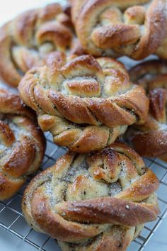 freshly baked pastries sitting on a cooling rack