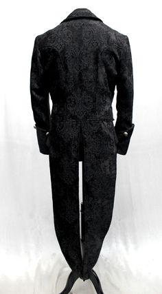 A luxurious, stylish formal coat with tails suitable for a maestro or a virtuoso. A tailcoat made in gorgeous black velvet with an intricate fleur de lis design on it. Fully lined with sleek black satin lining inside. A formal collar, long pointed tails and wide cuffs with medieval lion metal buttons at front and on cuffs give this coat a vintage style. Two small pockets on either side in front. Perfect for the most grand performance or masquerade..this coat is amazing! Comes in sizes: Small-3X. Formal Coat, Mens Vests, Vests Mens, Wide Cuff, Metal Buttons, New Man, Black Satin, Black Velvet, Mens Coats