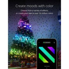 a christmas tree with colorful lights in front of it and the text create moods with color choose from a variety of effects or create your own