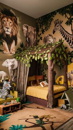 a child's bedroom decorated with jungle animals