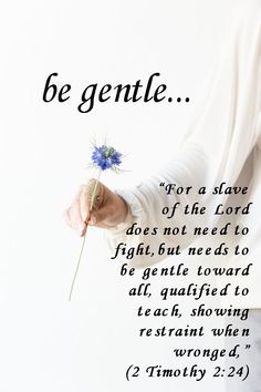 a woman holding a flower with the words be gentle