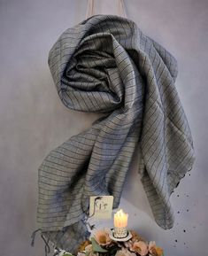 * CRAFTED FROM 100% premium silk viscose * Authentically Made in India * Artisan Handcrafted Discover County Blush's selection of chic and unisex scarves, featuring trendy black and grey color palettes in soft, high-quality fabrics. The Urban Nights Scarf Collection offers effortlessly stylish accessories for layering. Each scarf boasts sophisticated monochrome colors like charcoal, heather grey, and rich black for an elegant look. The luxe fabrics provide comfort with a touch of luxury. Elevate Monochrome Color Palette, Black And White Scarf, Fabric Scarf, Woven Scarves, Handwoven Scarf, Grey Color Palette, Dyed Linen, Circle Scarf, Loop Scarf