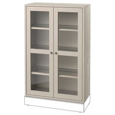 a white cabinet with glass doors and shelves