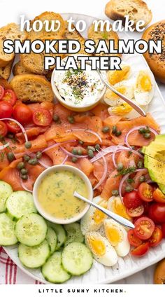 an image of smoked salmon platter with vegetables and bread on the side for dipping