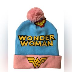 This Cozy Wonder Women Winter Hat Has Very Unique Baby Pink And Baby Blue Colors. It Is New With Tags, Soft And Stretchy. #Wonderwoman #Dccomics #Superman #Batman #Dc #Justiceleague #Dcuniverse #Aquaman #Galgadot #Comics #Flash #Dceu #Theflash #Marvel #Joker #Dianaprince #Ww #Harleyquinn #Greenlantern #Love #Cyborg #Art #Cosplay #Superhero #Spiderman #Henrycavill #Supergirl #Brucewayne #Zacksnyder #Avengers #Girlpower #Girl #Love #Girls #Womenempowerment #Girlboss #Fashion #Instagood #Women #Bea Trendy Warm Blue Hats, Trendy Pink Cotton Beanie, Warm Pink Cotton Hat, Blue Novelty Hat, One Size Fits Most, Pink Novelty Winter Hats, Fun Pink Hat, One Size, Playful Pink Beanie, One Size Fits Most, Fun Pink Beanie Hat, Playful Pink Beanie (one Size Fits Most)