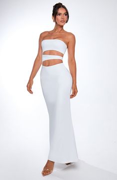 Take their breath away in the Milia maxi, designed in our stretchy, slinky fabric that's double layered to snatch you in all the right places. A strapless neckline and slash details to the body completes the look. 



Colour: White.

Stretch slinky fabric.

Fully lined.

Strapless neckline.

Slashed style cut outs to body.

Hugs the figure.

Invisible zip fastening.

Maxi length.

Model is an XS and is wearing an XS.

 Size: XS, S, M, L, XL, XXL Split Long Dress, Vest Blouse, Loungewear Dresses, Maxi Dress Sale, Strapless Neckline, Maxi Dress Navy, Invisible Zip, Dress Pant, White Maxi Dresses