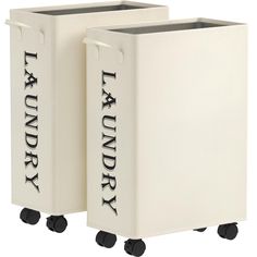 two white laundry bins sitting on wheels with black lettering that read laundry and the words laundry