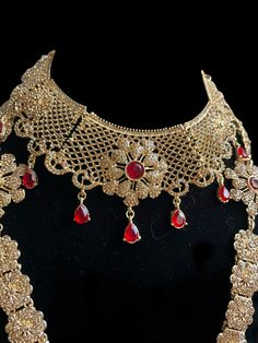 This is the perfect set to give yourself a royal look for your next special occasion! It comes as a full choker, long necklace, passa, earrings and tikka and can be worn separately for a lighter look! 3 Gorgeous colors to pick from ! Elegant Red Bridal Necklace For Ceremonial Occasions, Red Kundan Necklace With Intricate Design For Ceremonial Occasions, Ceremonial Red Kundan Necklace With Intricate Design, Ruby Jewelry Sets For Party And Festivals, Festive Red Jewelry Set With Intricate Design, Red Festive Tikka For Wedding, Festive Red Tikka For Wedding, Red Festive Wedding Tikka, Festive Red Wedding Tikka