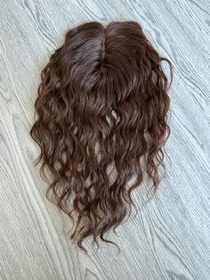 "🍀 Item specific 💕40cm options are in stock and ready to ship ❤️  Important note, the item length is the length of the raw hair using to make the item, once it's curled then it'll appear shorter ❤️ - Item: 100% Human Hair Topper - Color: Chocolate brown  - Texture: curly wavy - Hair Type: Remy Hair 🔥 cold wave perm treated 🔥 - Base Material: Lace - silk based - ultra-realistic look - Base Size: 3\" x 5\" - Attachment Method: Clips - Density: medium density  - Cap Construction: Partially hand-tied mono - Customization: Available (please contact us for more details) ❤️ Last photo is captured at our workshop (not an internet stock photo) showcasing the construction of ultra-realistic silk-based Lavia wigs and toppers cap. ❤️ No heat tools need to be used with this topper to maintain its c Wave Perm, Good Quality Wigs, Hair Topper, Beautiful Curly Hair, Brown Texture, Wavy Curly Hair, Wide Tooth Comb, Raw Hair, Lace Silk