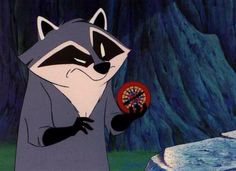 a raccoon is holding a dart in its hand