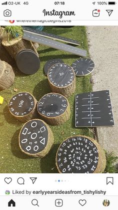 several different types of wooden discs and numbers on the ground next to each other in front of an instagram sign