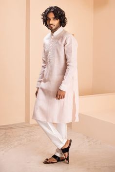 Baby pink linen kurta with placement dori embroidery on front. Paired with a contrasting plain aligadhi. - Aza Fashions Embroidered Sets For Wedding And Eid, Embroidered Linen Straight Kurta Set, Diwali Embroidered Straight Kurta, Traditional Long Sleeve Linen Kurta, Festive Embroidered Linen Set, Festive Long Sleeve Linen Sets, Eid Linen Kurta With Embroidered Border, Diwali Linen Straight Kurta, Traditional Kurta With Embroidery For Diwali