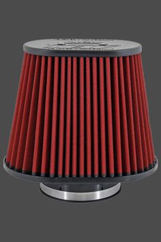 a red air filter on top of a metal stand with a black base and silver trim