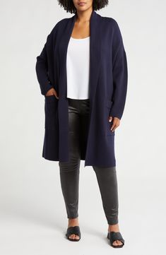 Love to layer your looks and cozy up in this open-front cardigan fashioned in a longline silhouette. 40" length (size Small) Open front Long sleeves Front patch pockets 50% viscose, 28% polyester, 22% nylon Machine wash, dry flat Imported Solid Open Front Sweater Coat For Work, Open Front Cardigan With Pockets For Layering, Casual Open Front Sweater Coat For Work, Relaxed Fit Open Front Cardigan With Pockets, Open Front Outerwear With Pockets For Loungewear, Layering Outerwear With Open Front And Pockets, Open Front Cardigan With Pockets For Daywear, Long Coat Cardigan With Pockets For Layering, Long Sweater Coat With Pockets For Layering