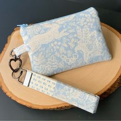 Handmade Zipper Pouch With Special Detailed Stitching And Coordinating Fabric. Wristlet Strap Detaches. Blue Rectangular Wristlet With Zipper Pouch, Everyday Blue Pouch Wristlet, Blue Wristlet With Zipper Pouch For Daily Use, Blue Pouch Wristlet As Gift, Blue Rectangular Wristlet With Zipper, Burgundy Clutch, Black Macrame, Red Clutch, Black Wristlet